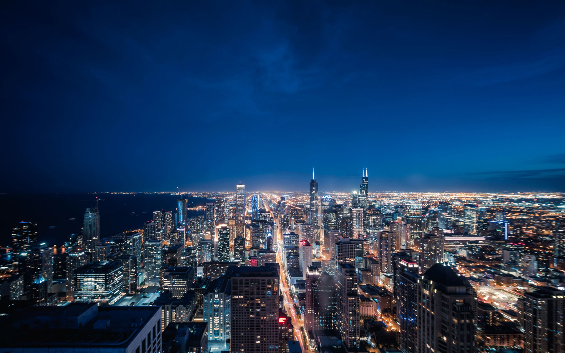 https://tramcooperativa.it/wp-content/uploads/2021/01/1160442138-Aerial-View-of-Chicago-cityscape-skyline-at-Night.jpg
